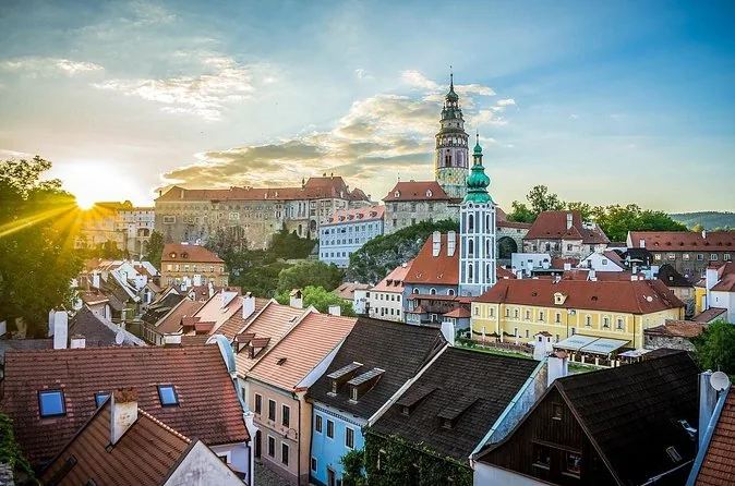 Český Krumlov rooftops and castle tower in warm light